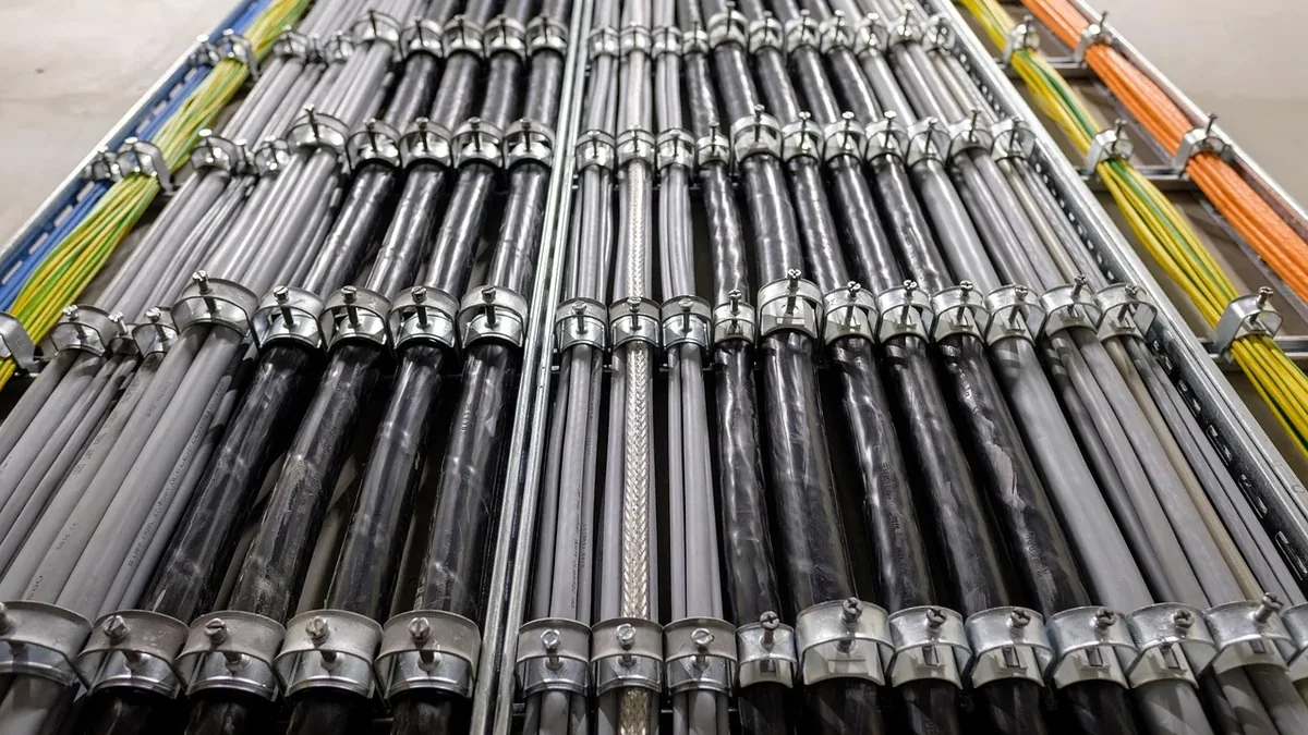 A large array of pipes and cables, likely part of an industrial or commercial infrastructure.